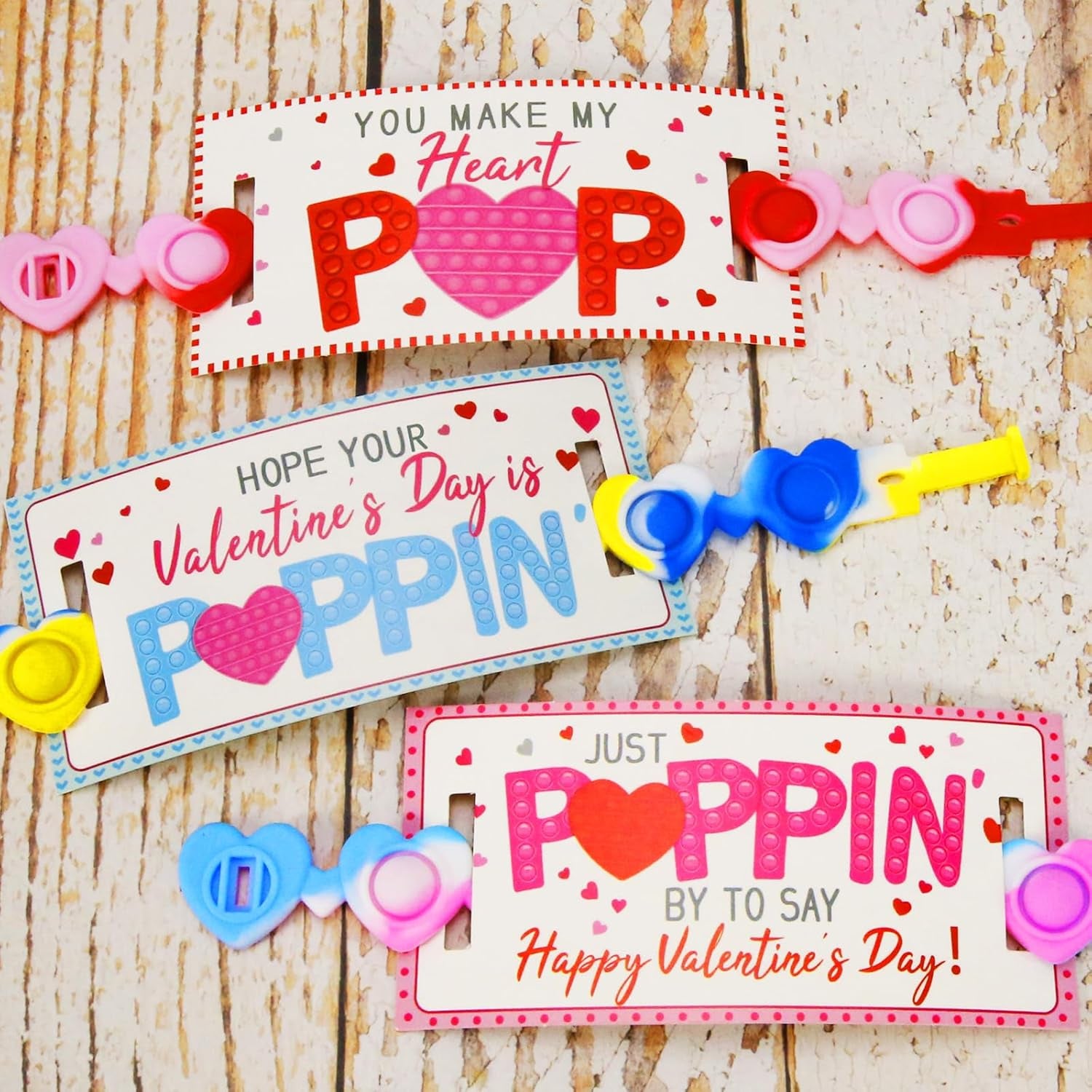 Valentines Day Gifts for Kids - 24 Pack Valentines Cards with Heart POP Bracelets - Sensory Fidget Toys Valentine for School Classroom Gift Exchange Party Favors Supplies for Toddlers Girls Boys